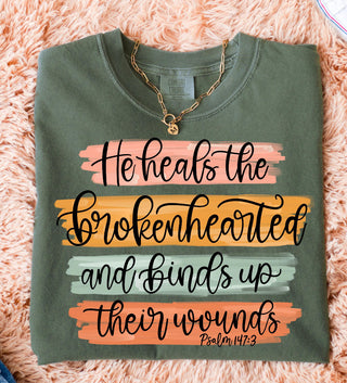 HE HEALS THE BROKEN HEARTED